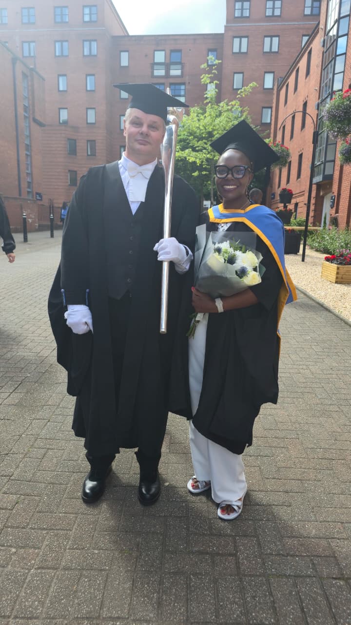 Catherine Cherotich with the University of Strathclyde mace bearer after her graduation ceremony