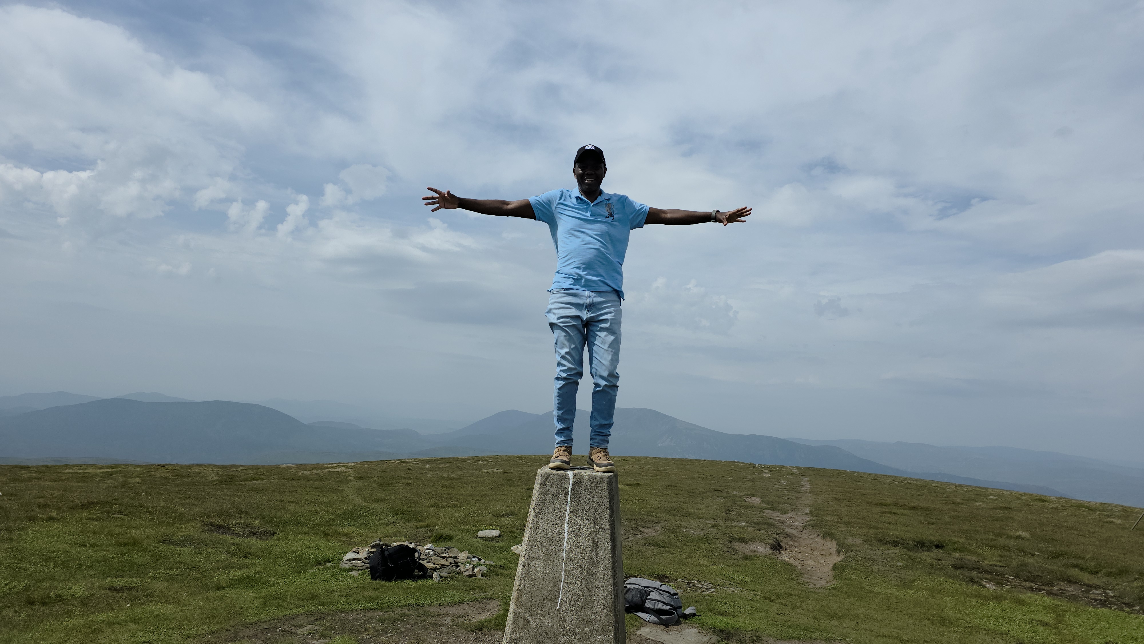 Linus Chirchir at the summit of Glas Tulaichean