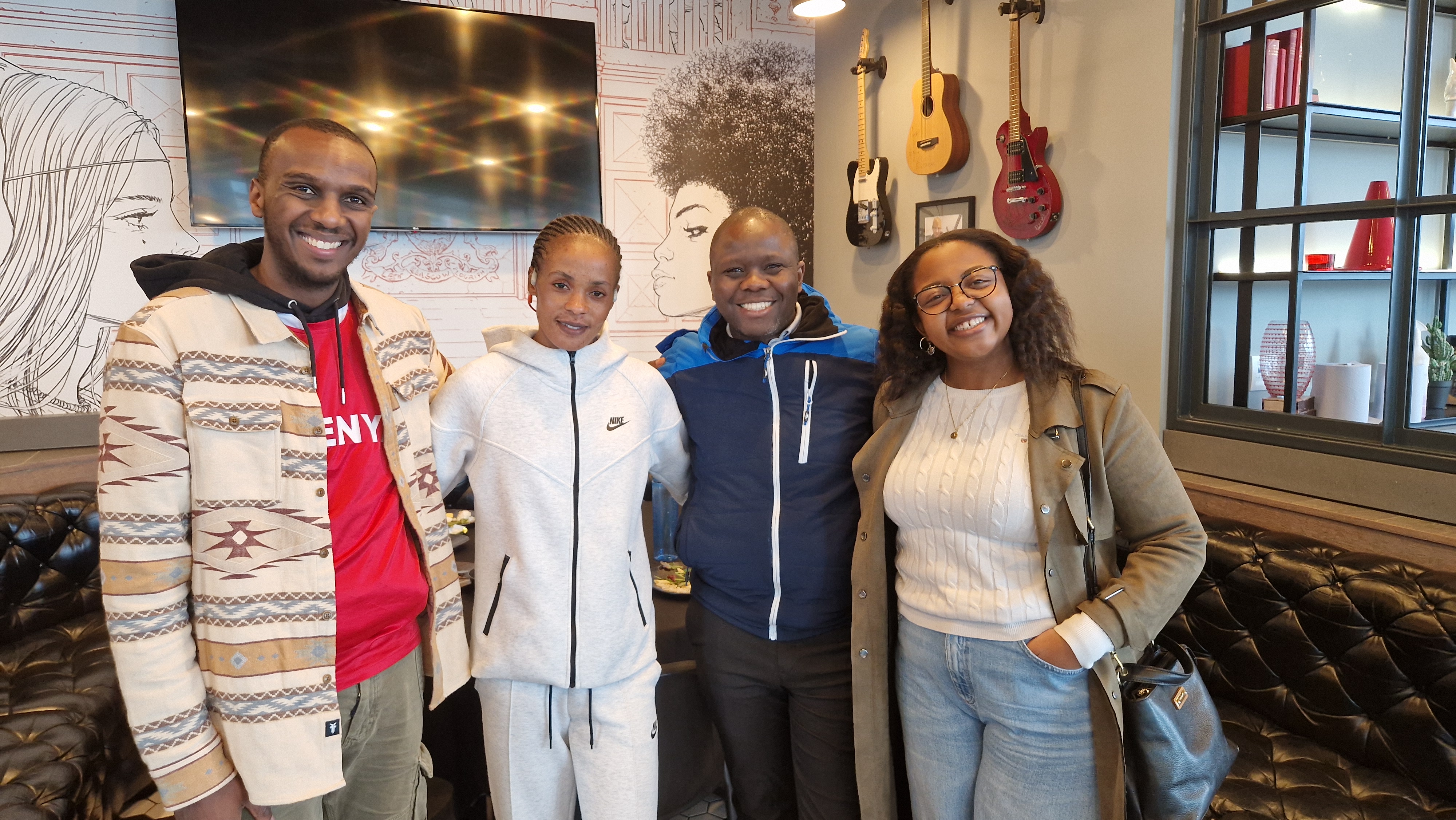 Group photo with Beatrice Chepkoech at the hotel